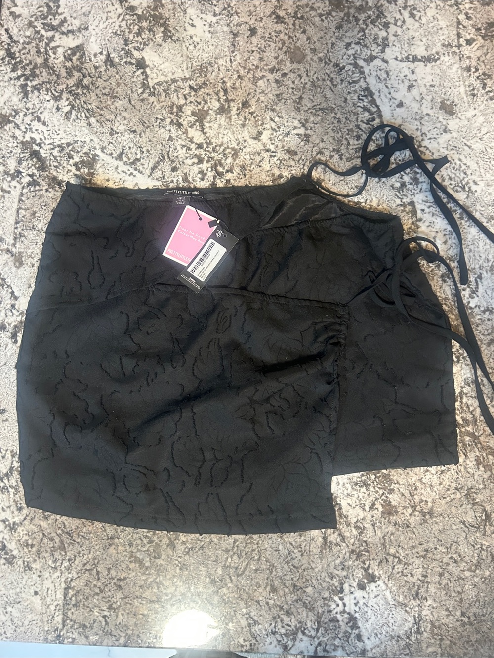 PrettyLittleThing Black Textured Skirt with Tag Detail